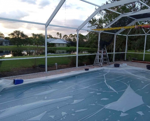 Applying pigment to pool enclosures