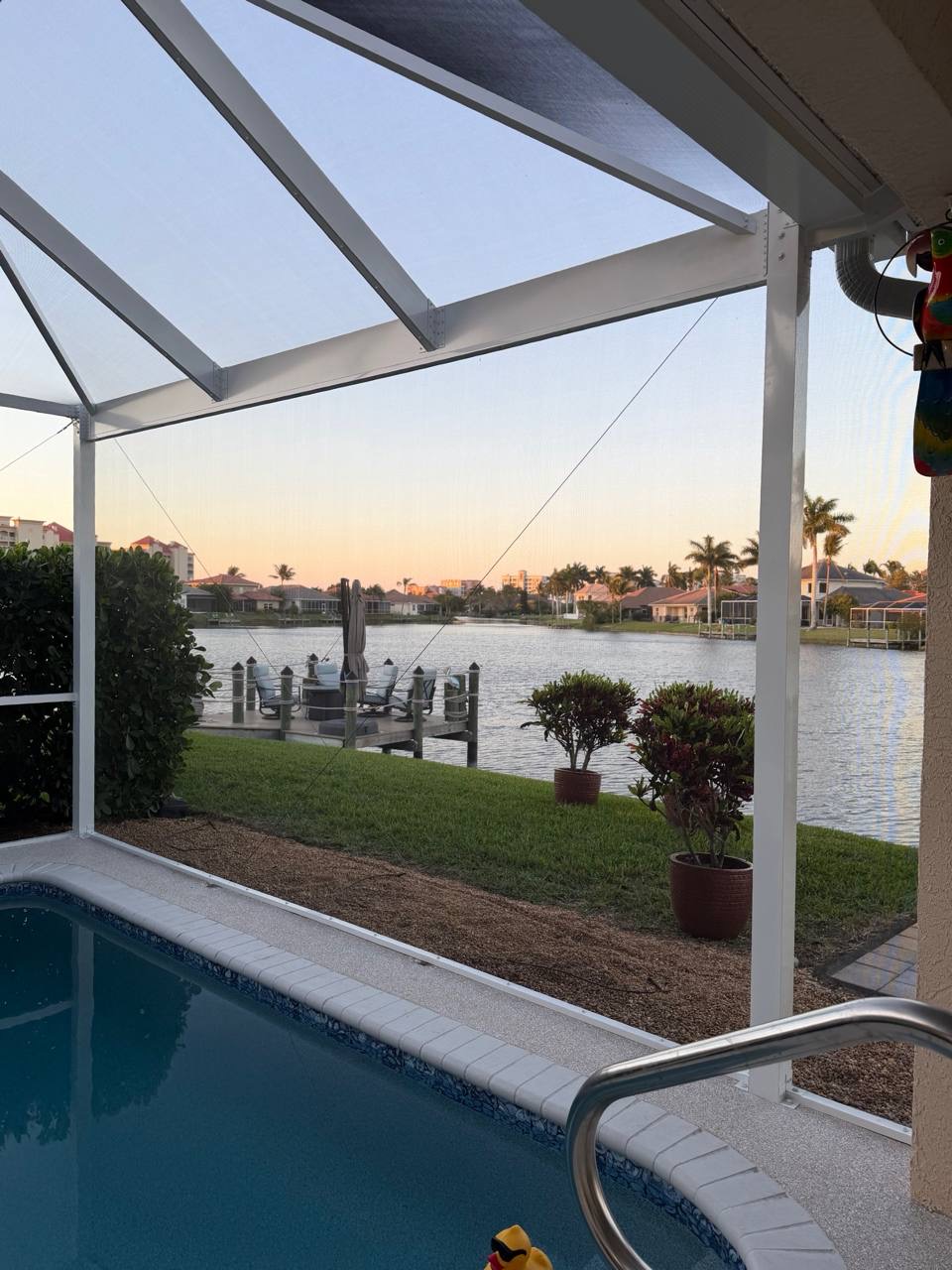 Panoramic pool screen enclosure overlooking canal Fort-myers Florida