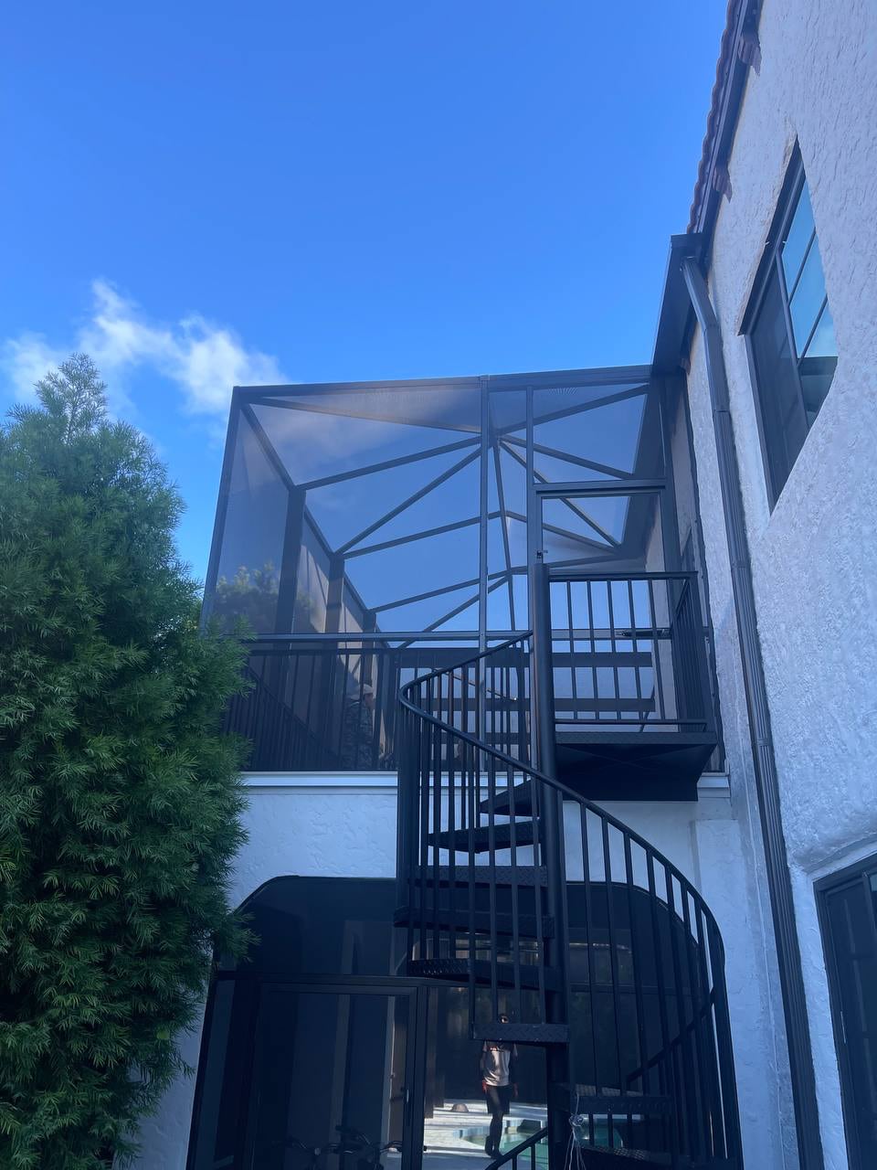 Two story screen enclosure exterior wall Venice FL