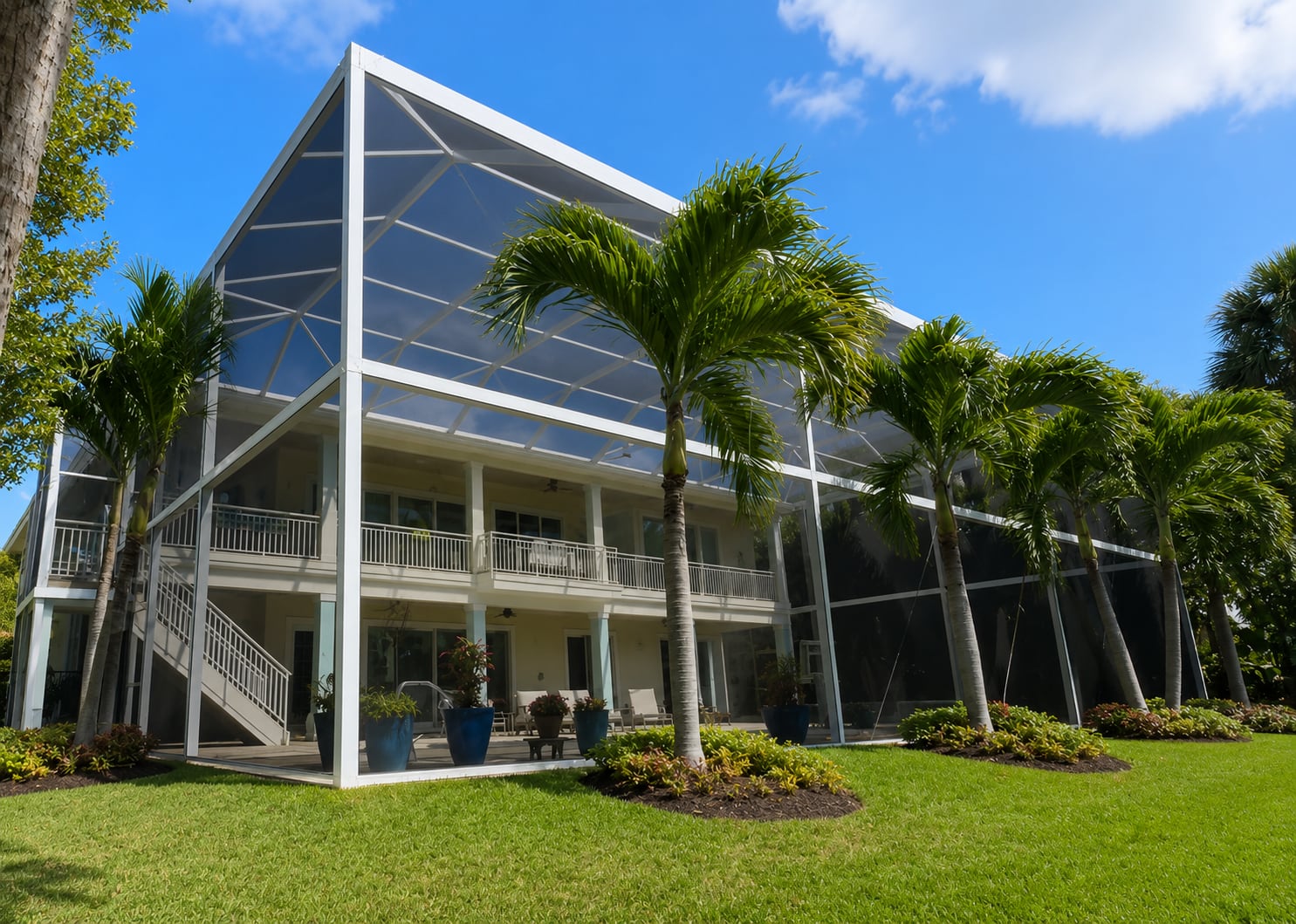 Two story panoramic screen enclosure blue Crab Ct Sanibel FL Project 4245
