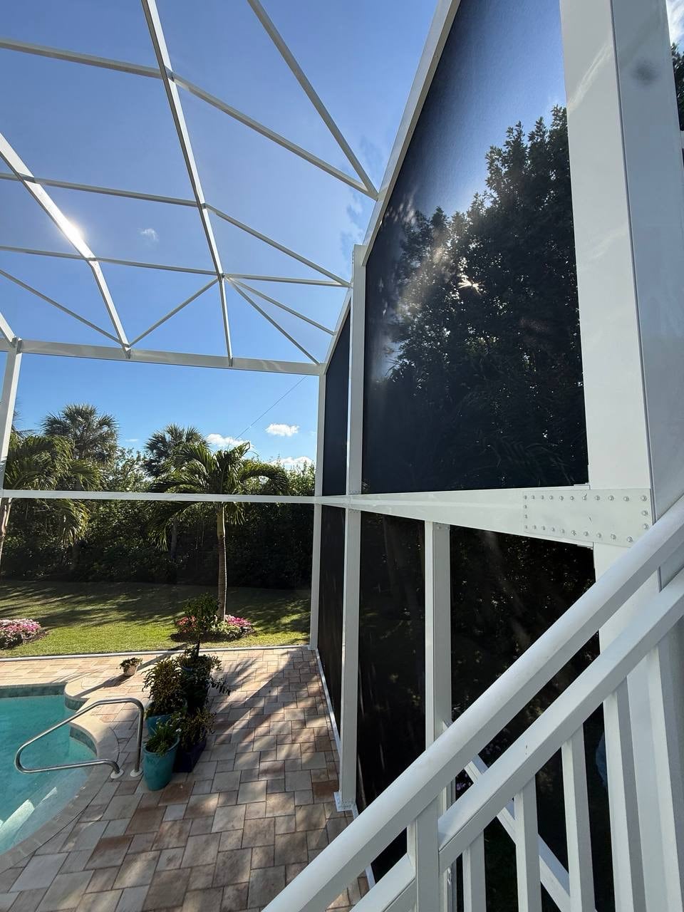 Large screen wall panel installed beside the two story home
