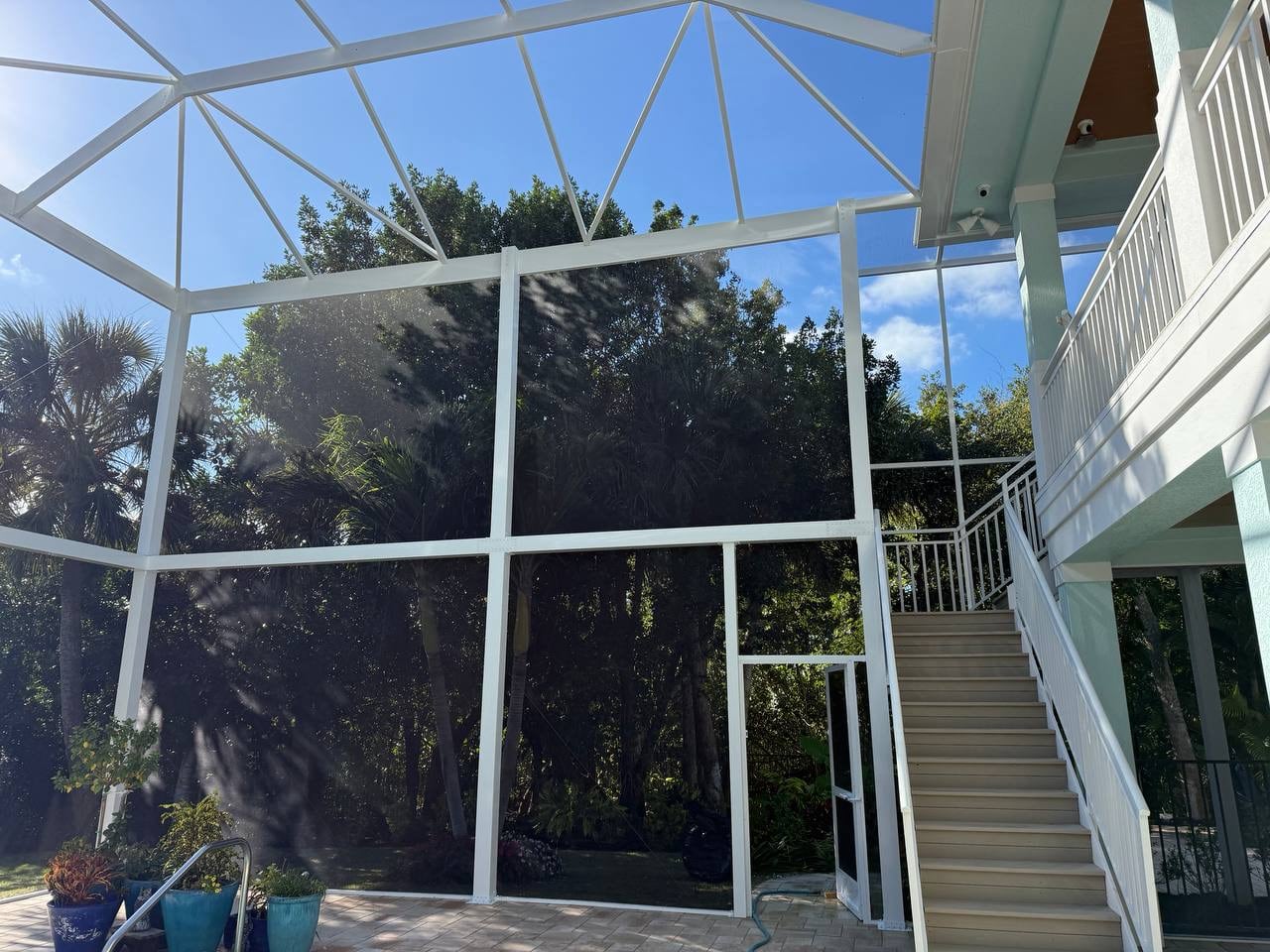 Wide span aluminum roof framework for the screened pool area