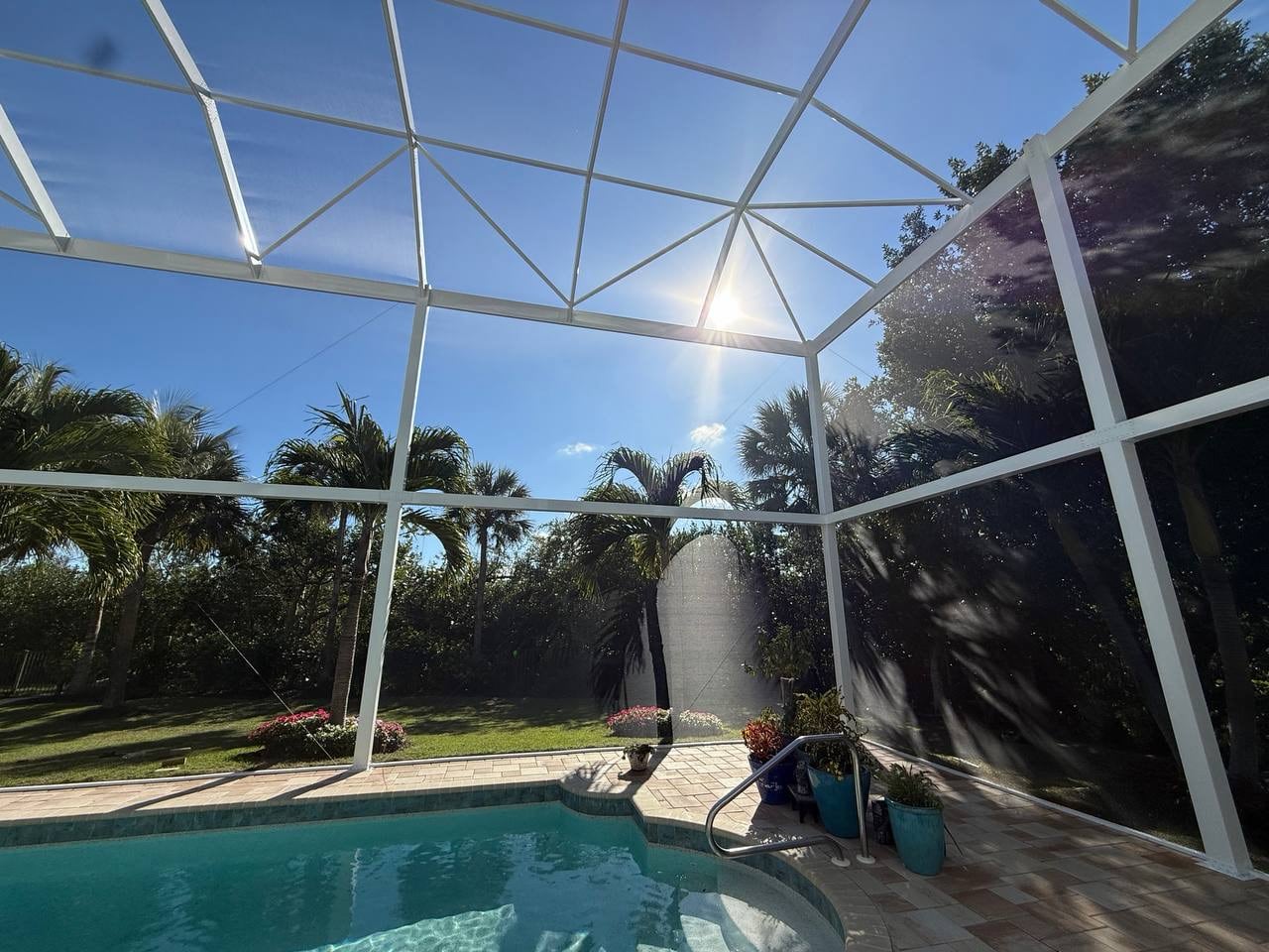 Custom gable roof framing above the residential swimming pool