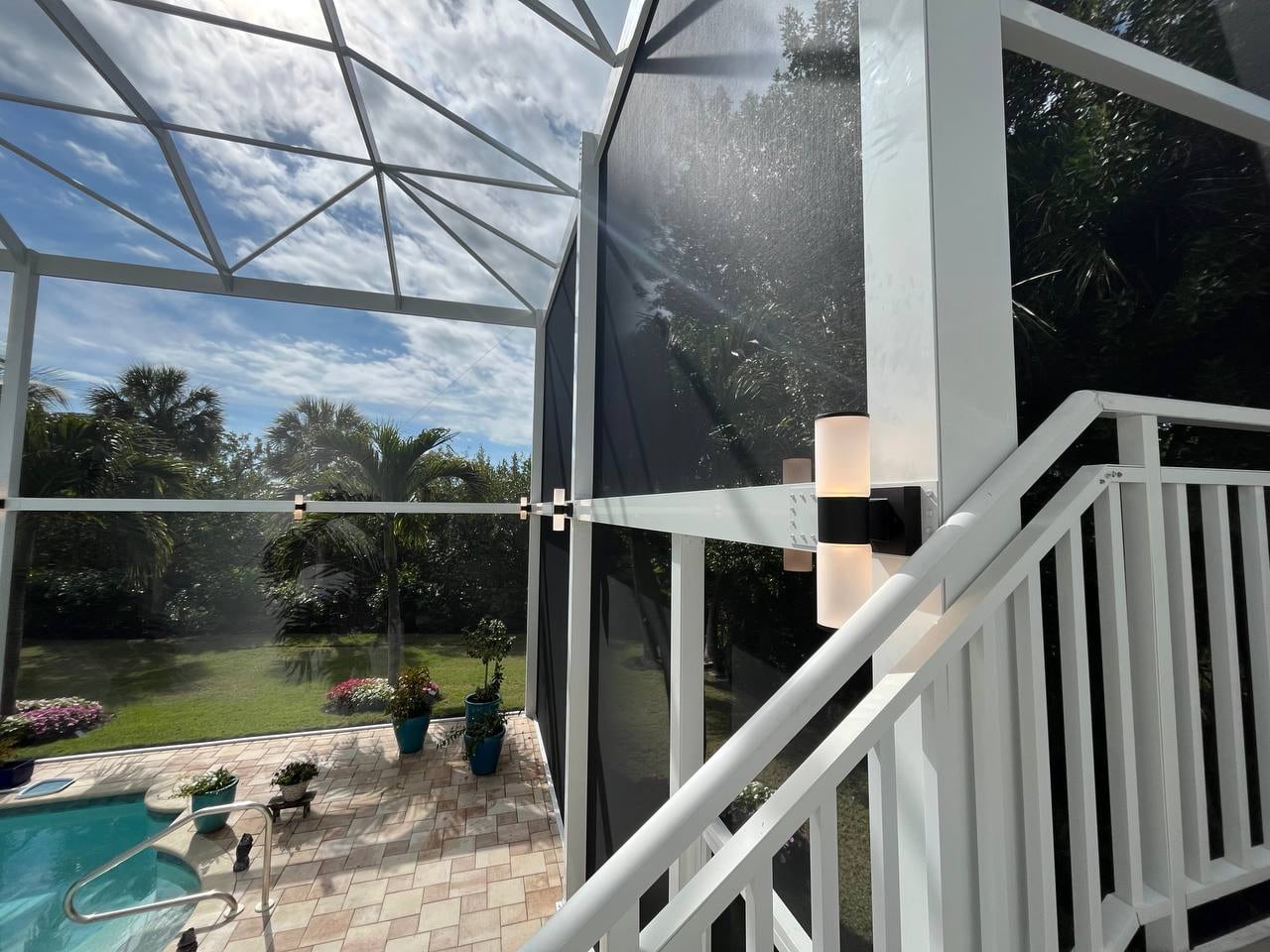 Lighting installed inside the two story screen cage
