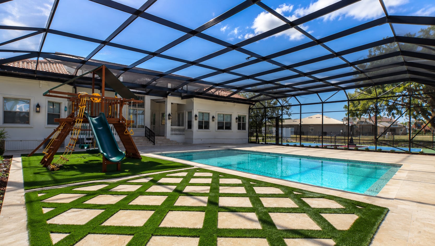 Screened pool checkerboard paver deck