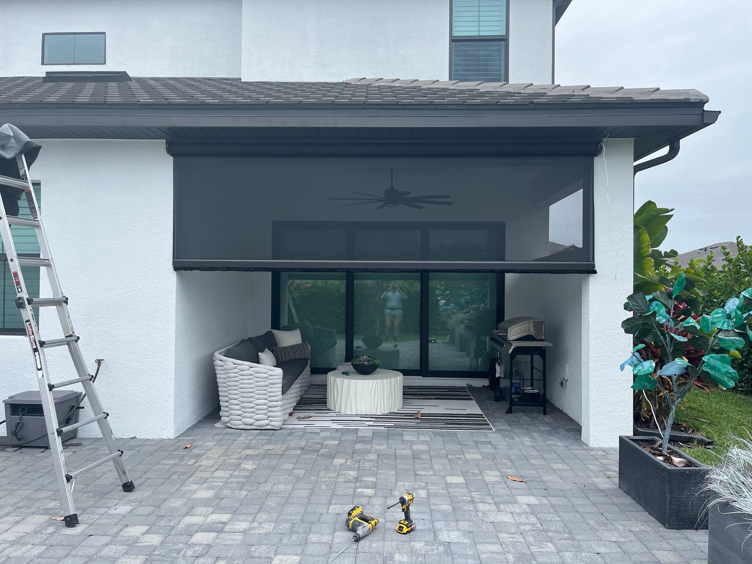 Completed motorized patio screen Naples