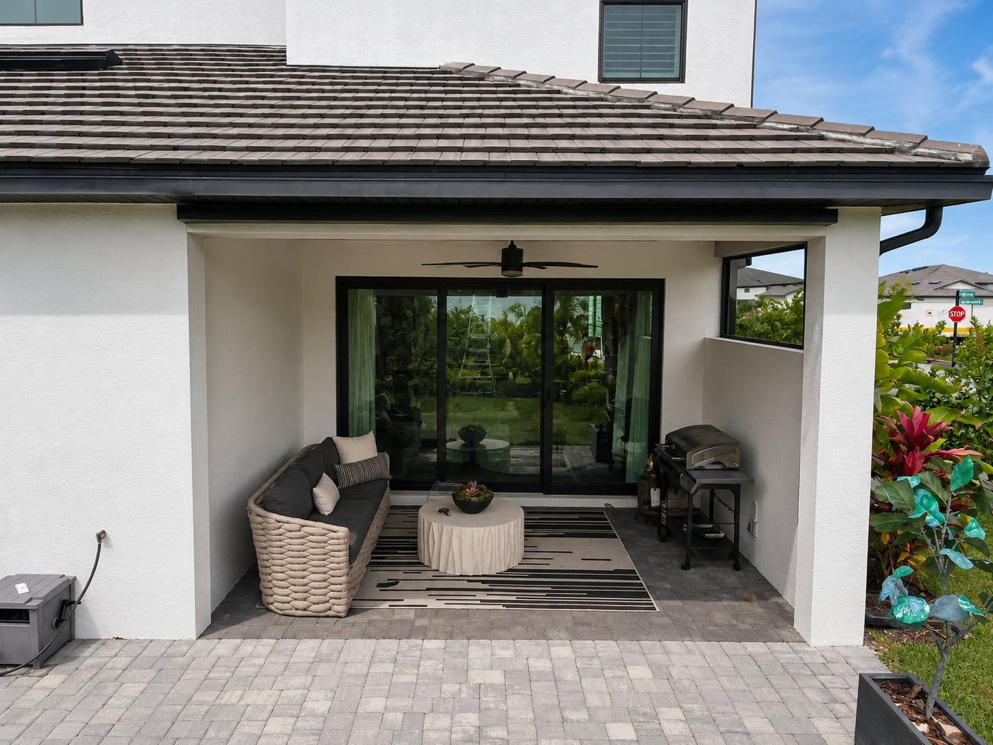 Patio before motorized screen installation Naples