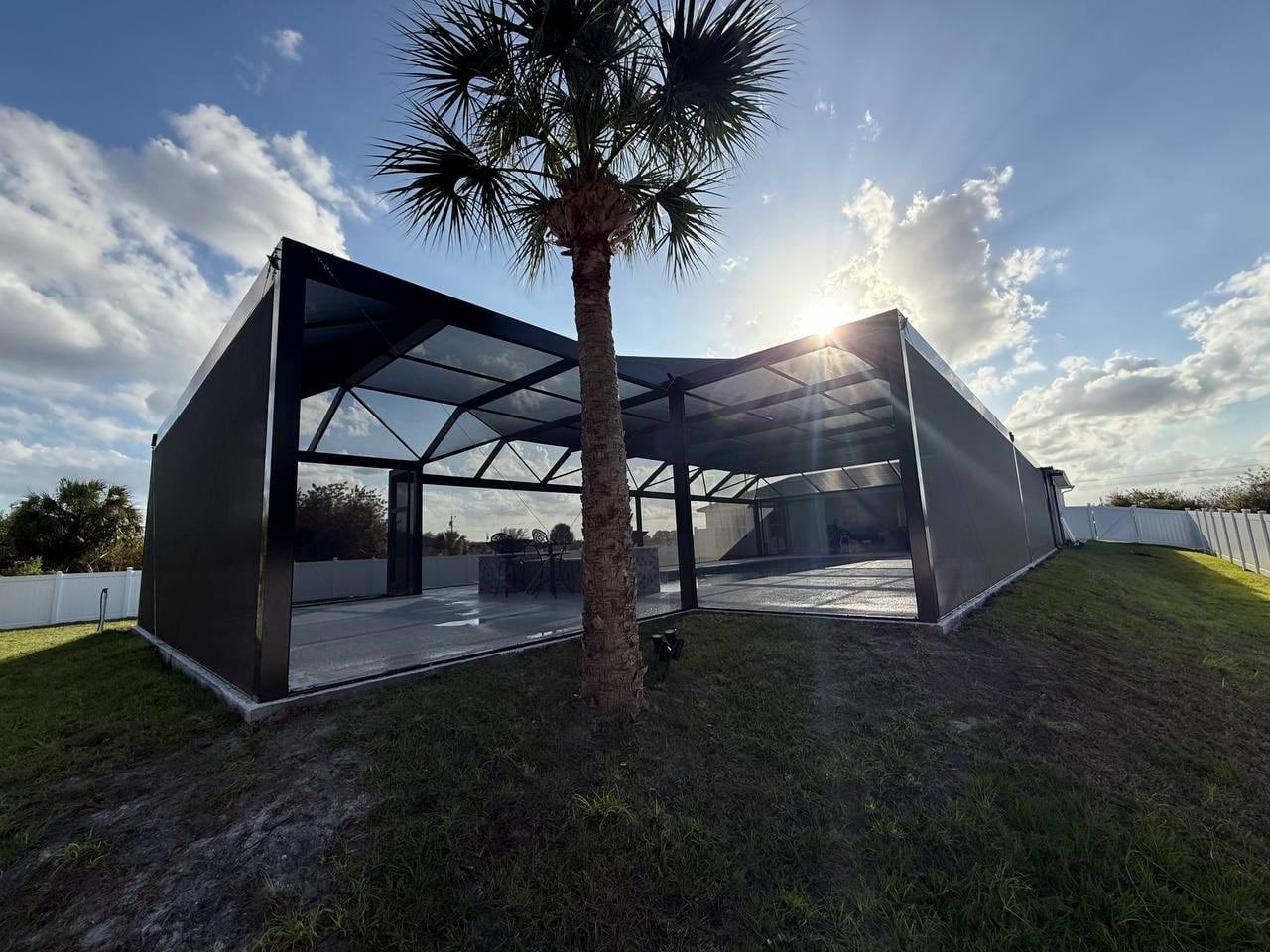 Pool cage attached to florida home